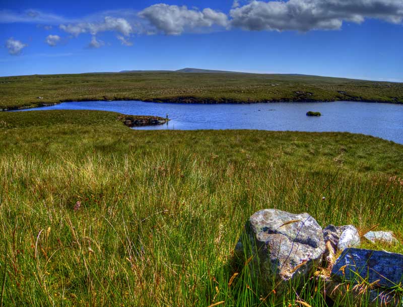 Dollag's Cottage guests fishing an Isle of Lewis trout loch